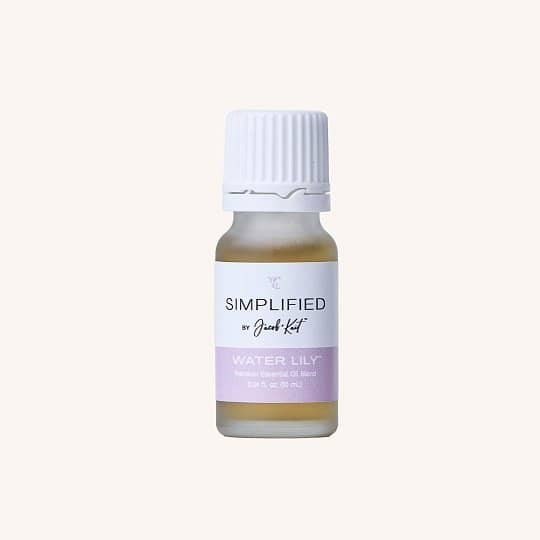 Simplified by Jacob + Kait Grapefruit Sorbet essential oil bottle with citrus slices nearby